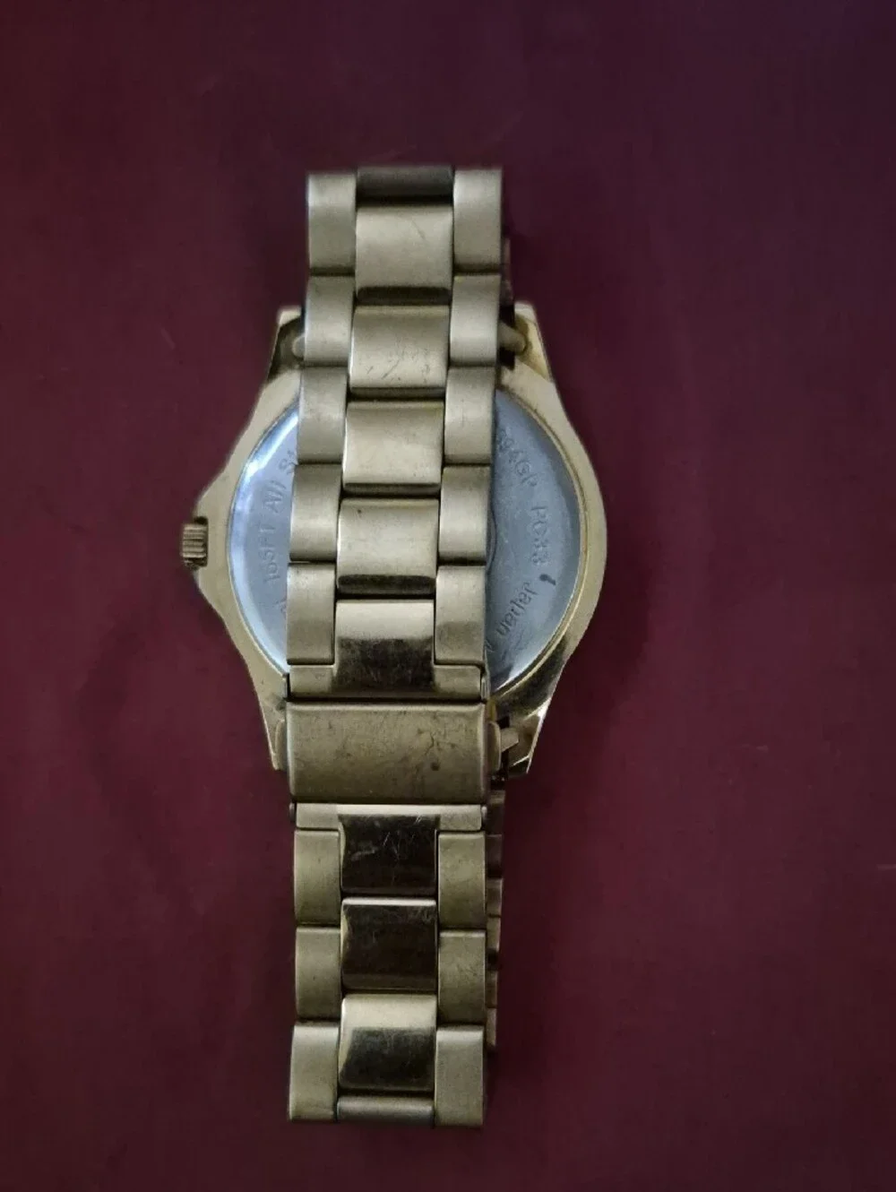 Armitron Gold-Tone Watch with Black Dial and Day-Date